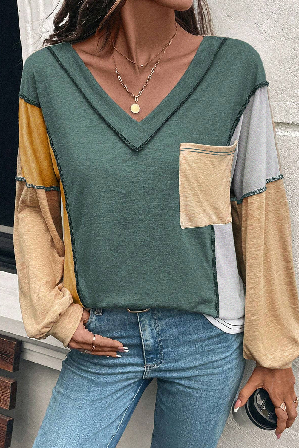 Elara | Exposed Stitch Colorblock V-Neck Top
